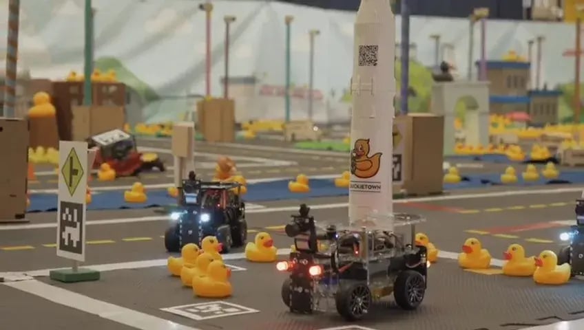 Development of an ackerman steering duckietown vehicle